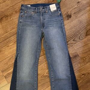 New with tags Gap two-tone flare jeans.
